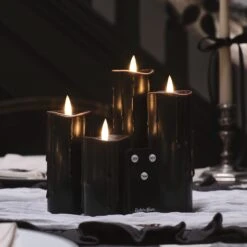 4 Bougies Piliers Fines TruGlow® En Cire Noire Coulante 11 4 Bougies Piliers Fines TruGlow® En Cire Noire Coulante -Boutique De Noël CA24035 4 bougies piliers fines truglow en cire noire coulante avec telecommande