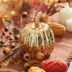 3 Citrouilles Lumineuses Mouchetées Cuivre En Verre 17 3 Citrouilles Lumineuses Mouchetées Cuivre En Verre -Boutique De Noël LL21058 DE21003 3 citrouilles lumineuses mouchetees cuivre en verre avec pommes de pin en feutre 2