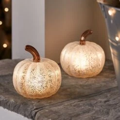 Citrouille Lumineuse En Verre à La Patine Blanche 22 Citrouille Lumineuse En Verre à La Patine Blanche -Boutique De Noël LL21059 Duo de citrouille lumineuse en verre a la patine blanche