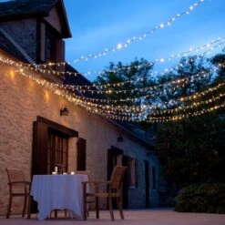 Guirlande Lumineuse Core Connect 30m 300 LED Blanc Chaud Câble Transparent Raccordable 17 Guirlande Lumineuse Core Connect 30m 300 LED Blanc Chaud Câble Transparent Raccordable -Boutique De Noël ML100YWC Outdoor LED Fairy Lights for Summer Patio Evenings P8 1a3792ea fc95 45b0 84df 935c31928ebb