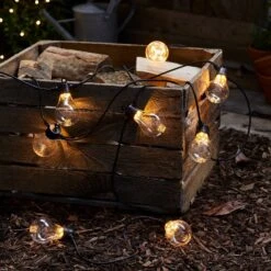 Guirlande Guinguette Core Connect 30 M 60 Ampoules Blanc Chaud Câble Noir Raccordable 11 Guirlande Guinguette Core Connect 30 M 60 Ampoules Blanc Chaud Câble Noir Raccordable -Boutique De Noël guirlande guinguette core connect allumees posees sur boite en bois 255d54af 4b7b 4cd2 8592 18d608c846dc